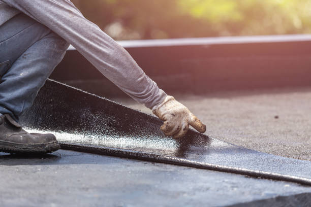 Professional Basement Waterproofing technician working in Aurora, IN